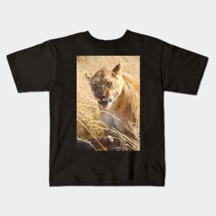 Lion at a Wildebeest Kill, Maasai Mara, Kenya Kids T-Shirt